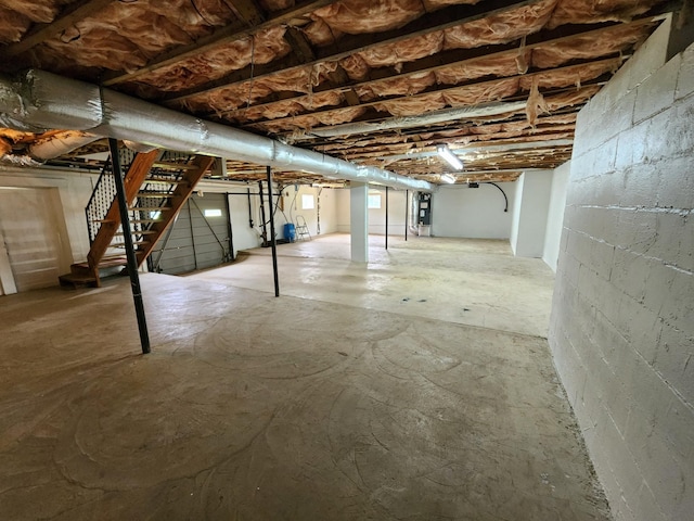 1036 Old Bottom Rd, Lafayette, TN 37083 - unfinished below grade area featuring stairs and concrete block wall