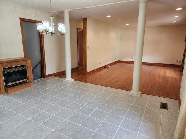 1036 Old Bottom Rd, Lafayette, TN 37083 - unfurnished living room with light wood-style flooring, recessed lighting, a fireplace, and a chandelier