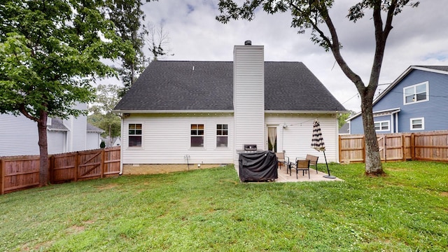 7146 Pepper Tree Cir, Fairview, TN 37062 - back of property with a chimney, a patio, and a fenced backyard