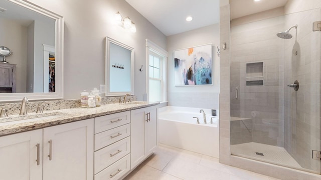 7146 Pepper Tree Cir, Fairview, TN 37062 - bathroom with a stall shower, a garden tub, double vanity, tile patterned flooring, and a walk in closet