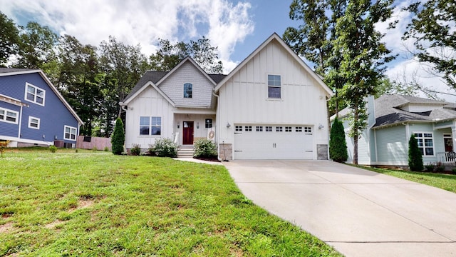 7146 Pepper Tree Cir, Fairview, TN 37062 - view of front of house with board and batten siding, a garage, driveway, a front yard, and stone siding