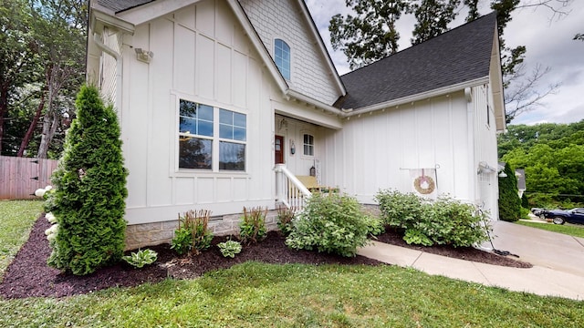 7146 Pepper Tree Cir, Fairview, TN 37062 - view of front facade with board and batten siding and a shingled roof
