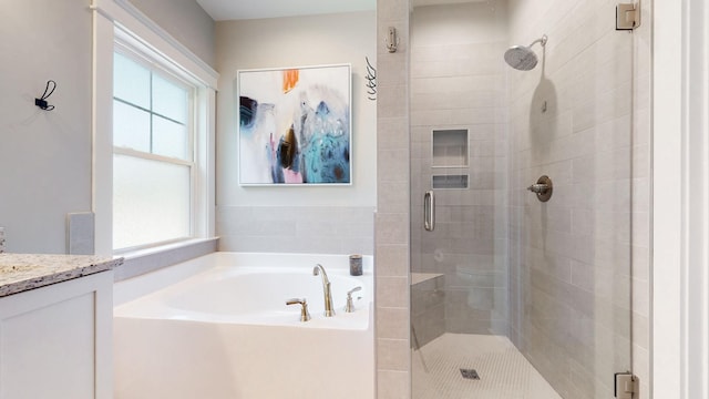 7146 Pepper Tree Cir, Fairview, TN 37062 - bathroom with a stall shower, healthy amount of natural light, a bath, and vanity