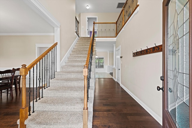 1741 Apache Way, Clarksville, TN 37042 - entryway featuring wood finished floors, stairs, and ornamental molding