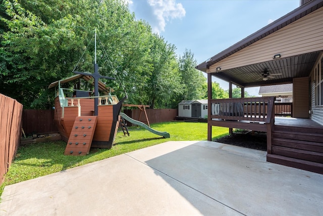 1741 Apache Way, Clarksville, TN 37042 - fenced backyard featuring a storage unit, a playground, a patio area, ceiling fan, and a wooden deck