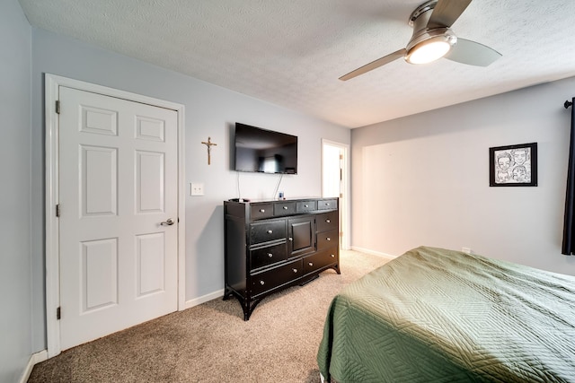 536 Deer Path, Gallatin, TN 37066 - bedroom with light carpet, a textured ceiling, and ceiling fan