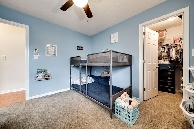 536 Deer Path, Gallatin, TN 37066 - bedroom featuring carpet flooring, ceiling fan, a walk in closet, and a closet