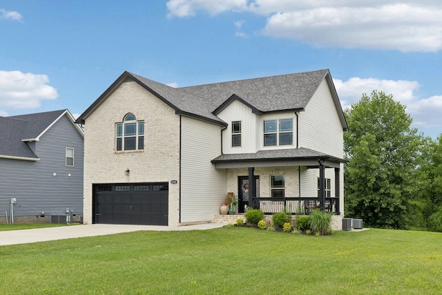 2968 Kirkwood Rd, Clarksville, TN 37043 - view of front facade with a porch, brick siding, an attached garage, and driveway