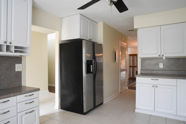 4861 Quail Run, Old Hickory, TN 37138 - kitchen featuring stainless steel fridge, ceiling fan, dark countertops, decorative backsplash, and light tile patterned flooring