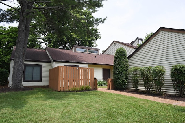 4861 Quail Run, Old Hickory, TN 37138 - rear view of house featuring a lawn and a shingled roof