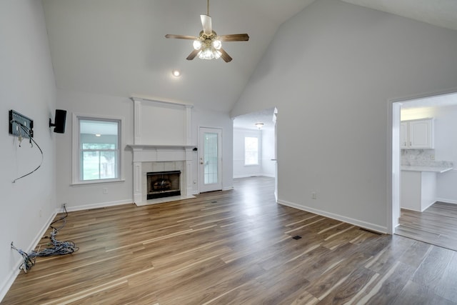 3216 Vestry Ave, Murfreesboro, TN 37129 - unfurnished living room with high vaulted ceiling, ceiling fan, wood finished floors, and a fireplace
