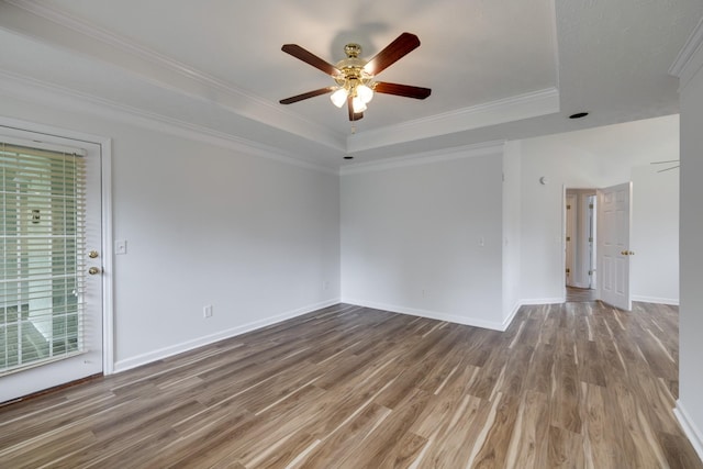 3216 Vestry Ave, Murfreesboro, TN 37129 - empty room featuring a raised ceiling, a ceiling fan, wood finished floors, and crown molding