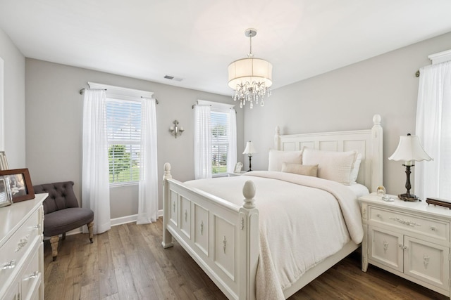 2515 Napa Valley Way, Columbia, TN 38401 - bedroom featuring a chandelier and dark wood-style flooring