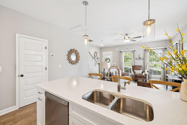 2515 Napa Valley Way, Columbia, TN 38401 - kitchen featuring dishwasher, hanging light fixtures, light countertops, and light wood-style floors
