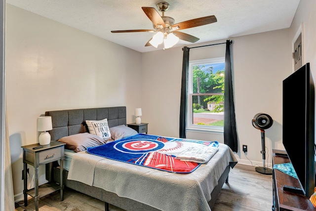7646 S Swift Rd, Goodlettsville, TN 37072 - bedroom with wood finished floors and a ceiling fan