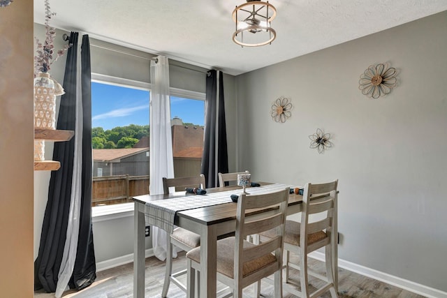 7646 S Swift Rd, Goodlettsville, TN 37072 - dining area with wood finished floors and a textured ceiling