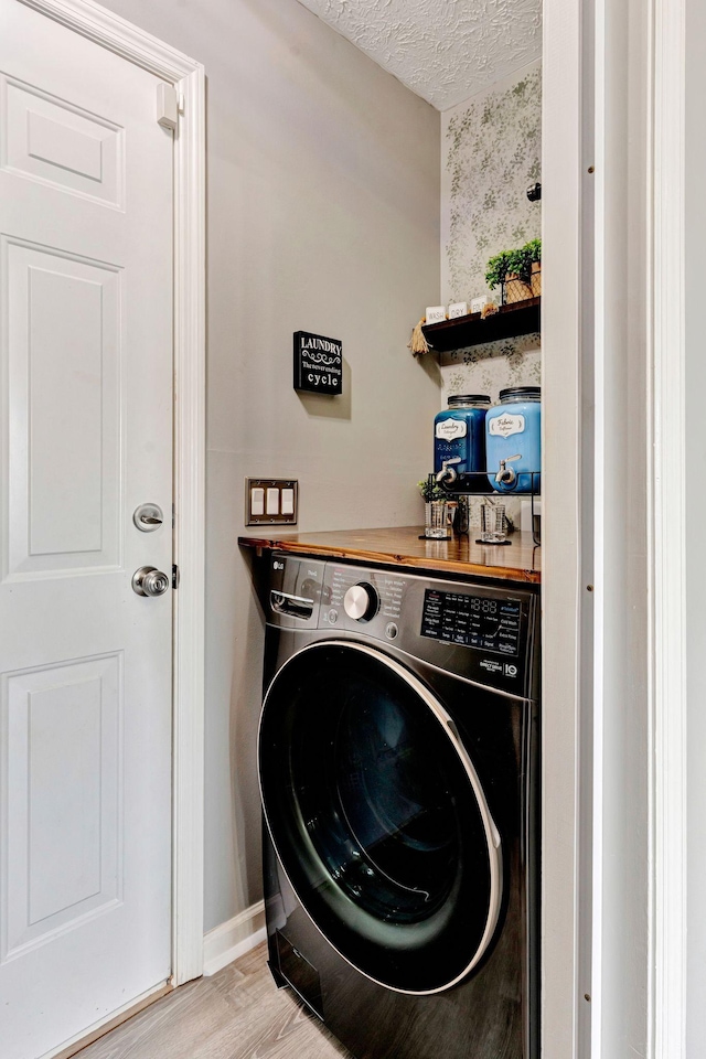 7646 S Swift Rd, Goodlettsville, TN 37072 - washroom with washer / clothes dryer and a textured ceiling