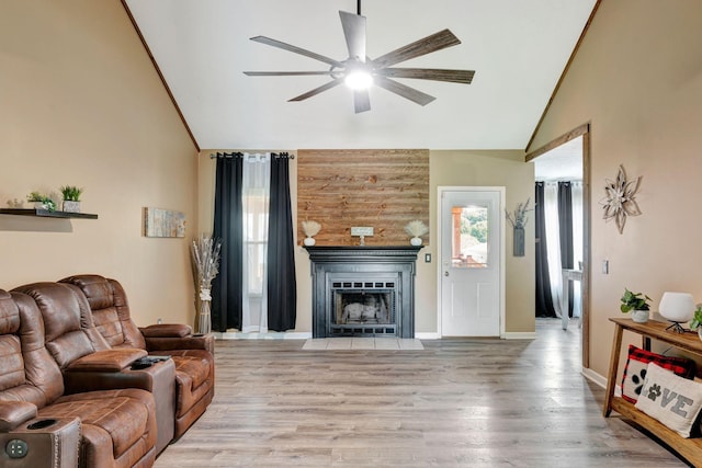 7646 S Swift Rd, Goodlettsville, TN 37072 - living room featuring a ceiling fan, light wood-style flooring, a fireplace, and high vaulted ceiling