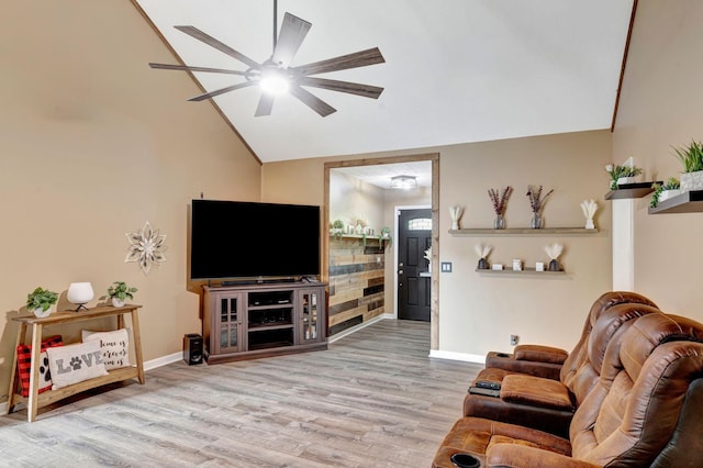 7646 S Swift Rd, Goodlettsville, TN 37072 - living area with wood finished floors, ceiling fan, and high vaulted ceiling