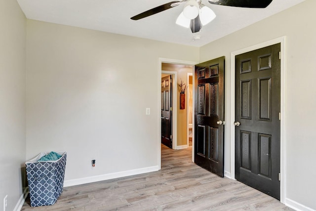7646 S Swift Rd, Goodlettsville, TN 37072 - unfurnished bedroom with light wood-type flooring and a ceiling fan