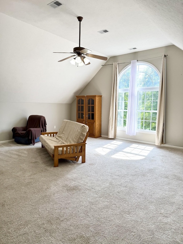 740 N Palmers Chapel Rd, White House, TN 37188 - living area with vaulted ceiling, carpet floors, and a ceiling fan
