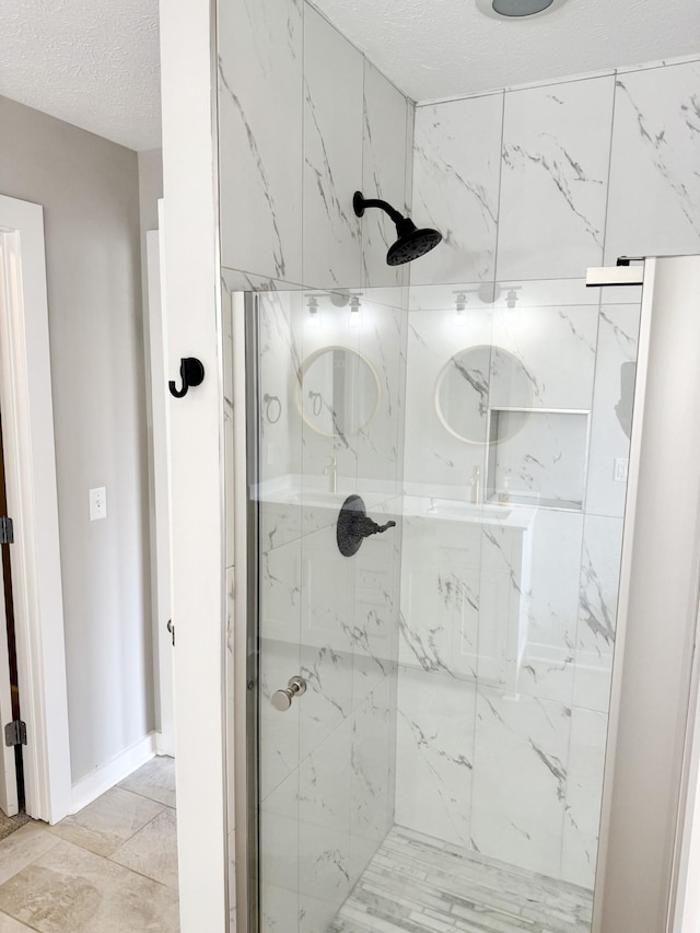 740 N Palmers Chapel Rd, White House, TN 37188 - bathroom with a marble finish shower and a textured ceiling