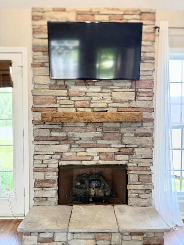 740 N Palmers Chapel Rd, White House, TN 37188 - detailed view of wood finished floors and a fireplace