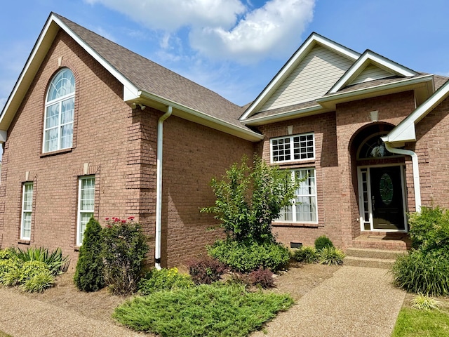 740 N Palmers Chapel Rd, White House, TN 37188 - view of property exterior featuring brick siding and a shingled roof