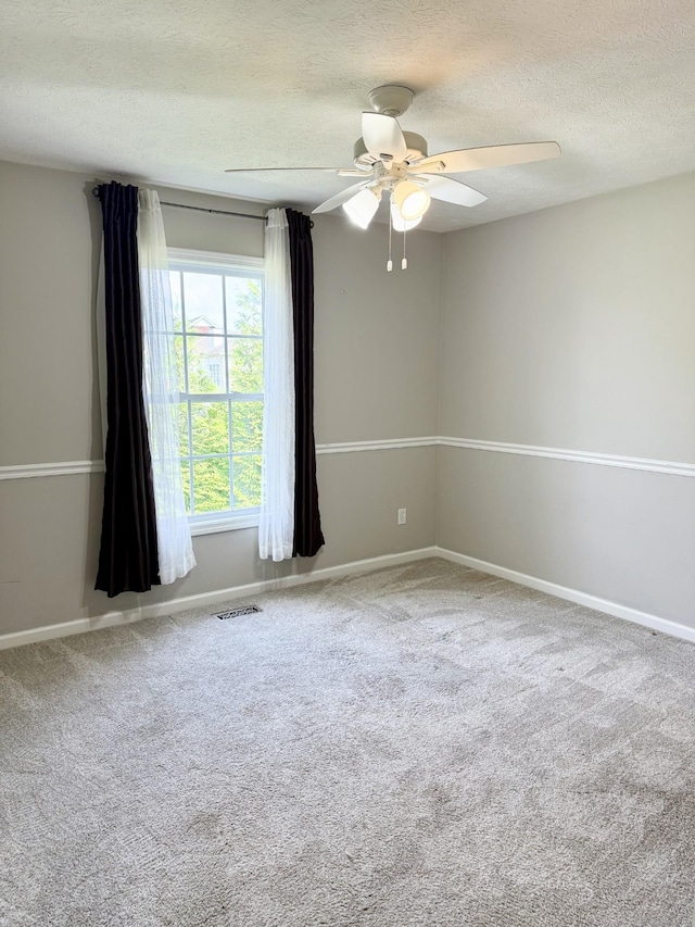 740 N Palmers Chapel Rd, White House, TN 37188 - empty room featuring a textured ceiling, ceiling fan, and carpet