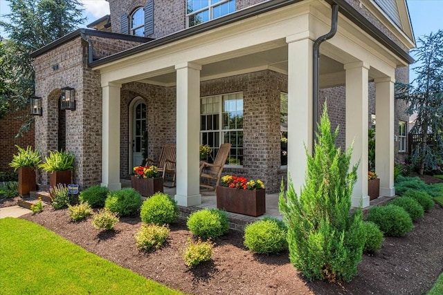 600 Tywater Crossing Blvd, Franklin, TN 37064 - doorway to property featuring a porch and brick siding