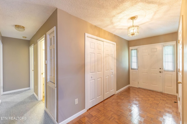 100 Cusick Cir, Lenoir City, TN 37772 - entryway featuring a textured ceiling and a chandelier