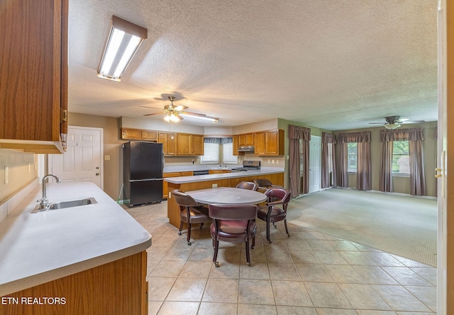 100 Cusick Cir, Lenoir City, TN 37772 - dining space featuring a ceiling fan, a textured ceiling, and light tile patterned flooring