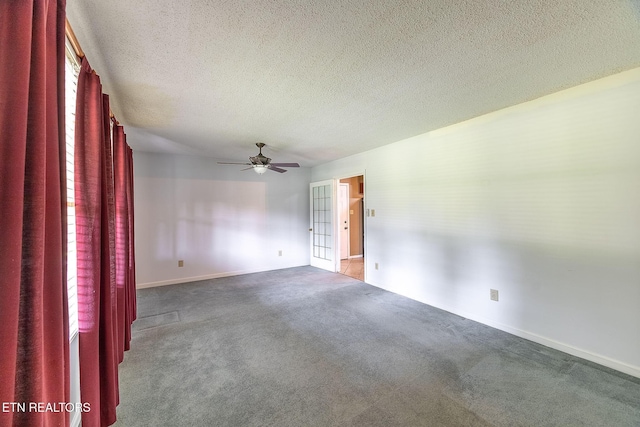 100 Cusick Cir, Lenoir City, TN 37772 - carpeted spare room featuring ceiling fan, a textured ceiling, and plenty of natural light