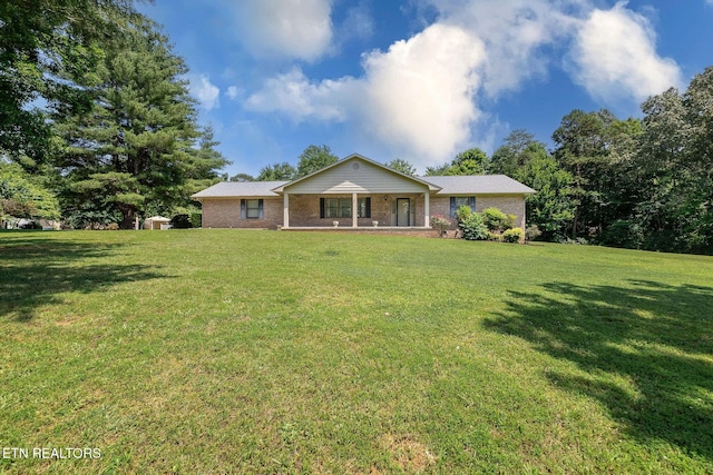 100 Cusick Cir, Lenoir City, TN 37772 - view of front facade with a front lawn, brick siding, and covered porch