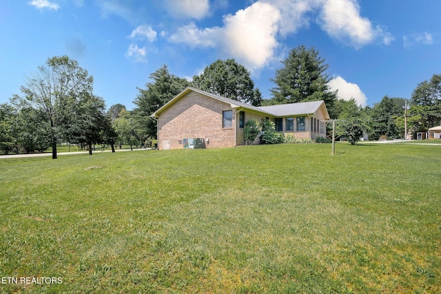 100 Cusick Cir, Lenoir City, TN 37772 - view of front of house with brick siding and a front lawn
