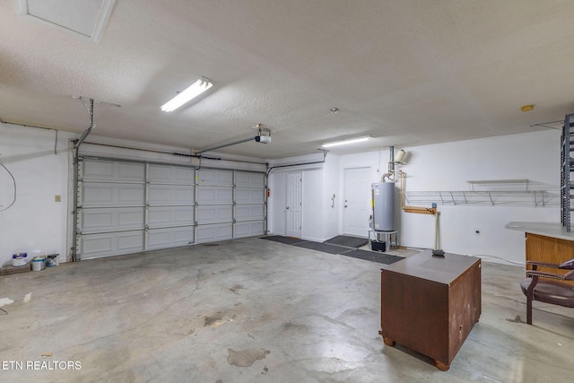 100 Cusick Cir, Lenoir City, TN 37772 - garage featuring water heater and a garage door opener