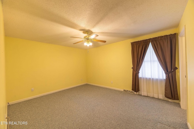 100 Cusick Cir, Lenoir City, TN 37772 - spare room featuring carpet flooring, a ceiling fan, and a textured ceiling