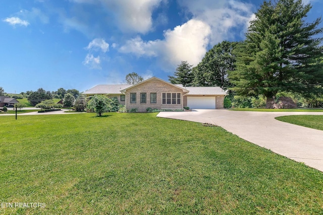 100 Cusick Cir, Lenoir City, TN 37772 - ranch-style home featuring driveway, brick siding, a front yard, and an attached garage