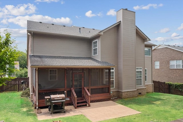 1164 Sydney Ter, Mount Juliet, TN 37122 - back of property featuring a sunroom, a patio area, a chimney, and a fenced backyard