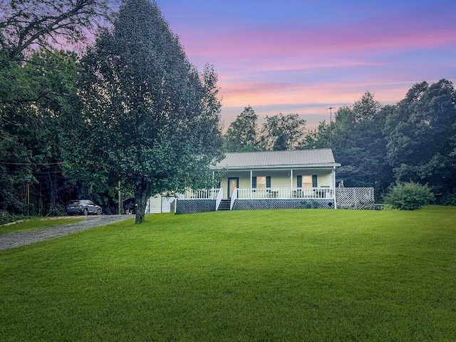 238 W Langston Way, Dalton, GA 30720 - farmhouse inspired home with a porch, a lawn, driveway, a garage, and a metal roof