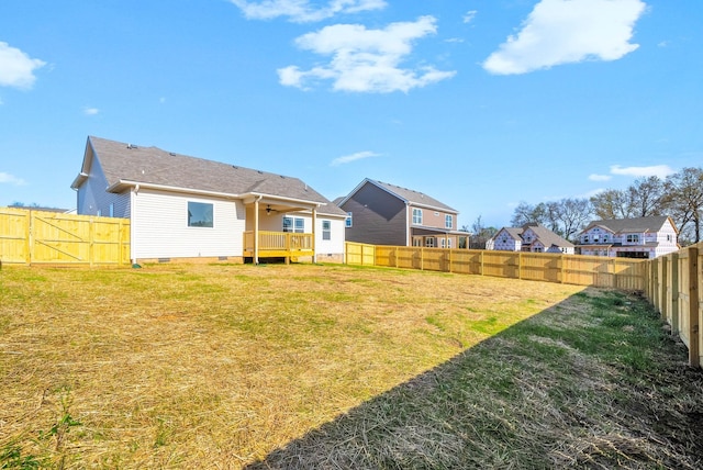 1250 Elizabeth Ln, Clarksville, TN 37042 - back of house featuring crawl space, ceiling fan, and a fenced backyard