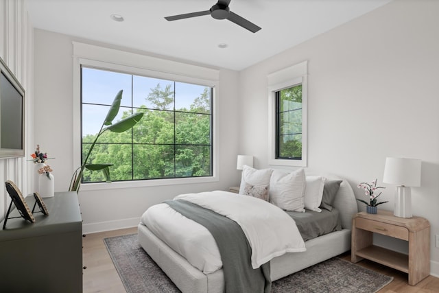 4896 Bethesda Rd, Thompsons Station, TN 37179 - bedroom with light wood-style flooring, ceiling fan, and recessed lighting