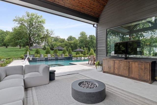 4896 Bethesda Rd, Thompsons Station, TN 37179 - view of patio featuring an outdoor pool, exterior kitchen, and view of scattered trees