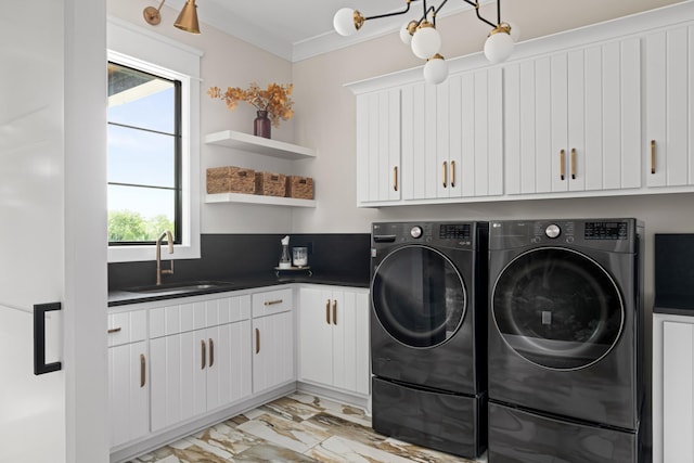 4896 Bethesda Rd, Thompsons Station, TN 37179 - laundry area featuring cabinet space, light marble finish floors, independent washer and dryer, and ornamental molding