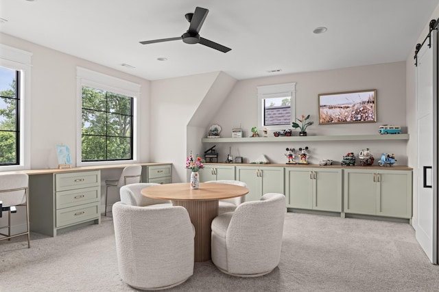 4896 Bethesda Rd, Thompsons Station, TN 37179 - dining space featuring a barn door, light colored carpet, a ceiling fan, plenty of natural light, and recessed lighting