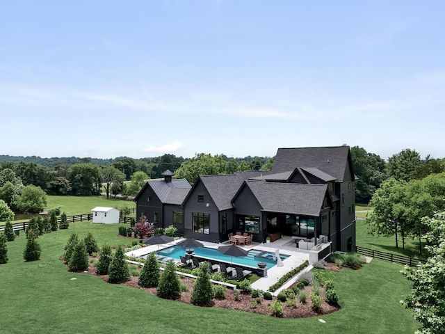 4896 Bethesda Rd, Thompsons Station, TN 37179 - view of pool featuring a patio, a fenced backyard, an outdoor hangout area, and a storage shed