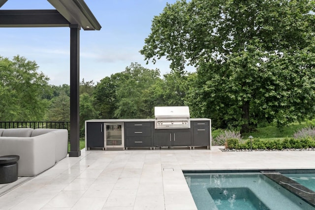 4896 Bethesda Rd, Thompsons Station, TN 37179 - swimming pool featuring a patio area and an outdoor kitchen