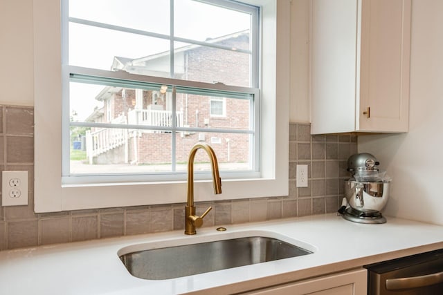 4017 Cedar Cir, Nashville, TN 37218 - kitchen featuring dishwasher, healthy amount of natural light, and tasteful backsplash