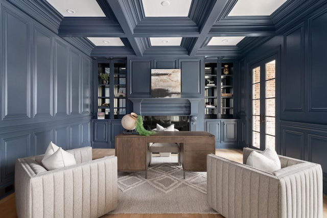 2455 Hidden River Ln, Franklin, TN 37069 - home office with a decorative wall, ornamental molding, coffered ceiling, a fireplace, and light wood-style floors