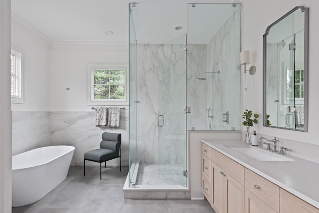 2455 Hidden River Ln, Franklin, TN 37069 - full bath with vanity, a marble finish shower, a soaking tub, tile walls, and ornamental molding